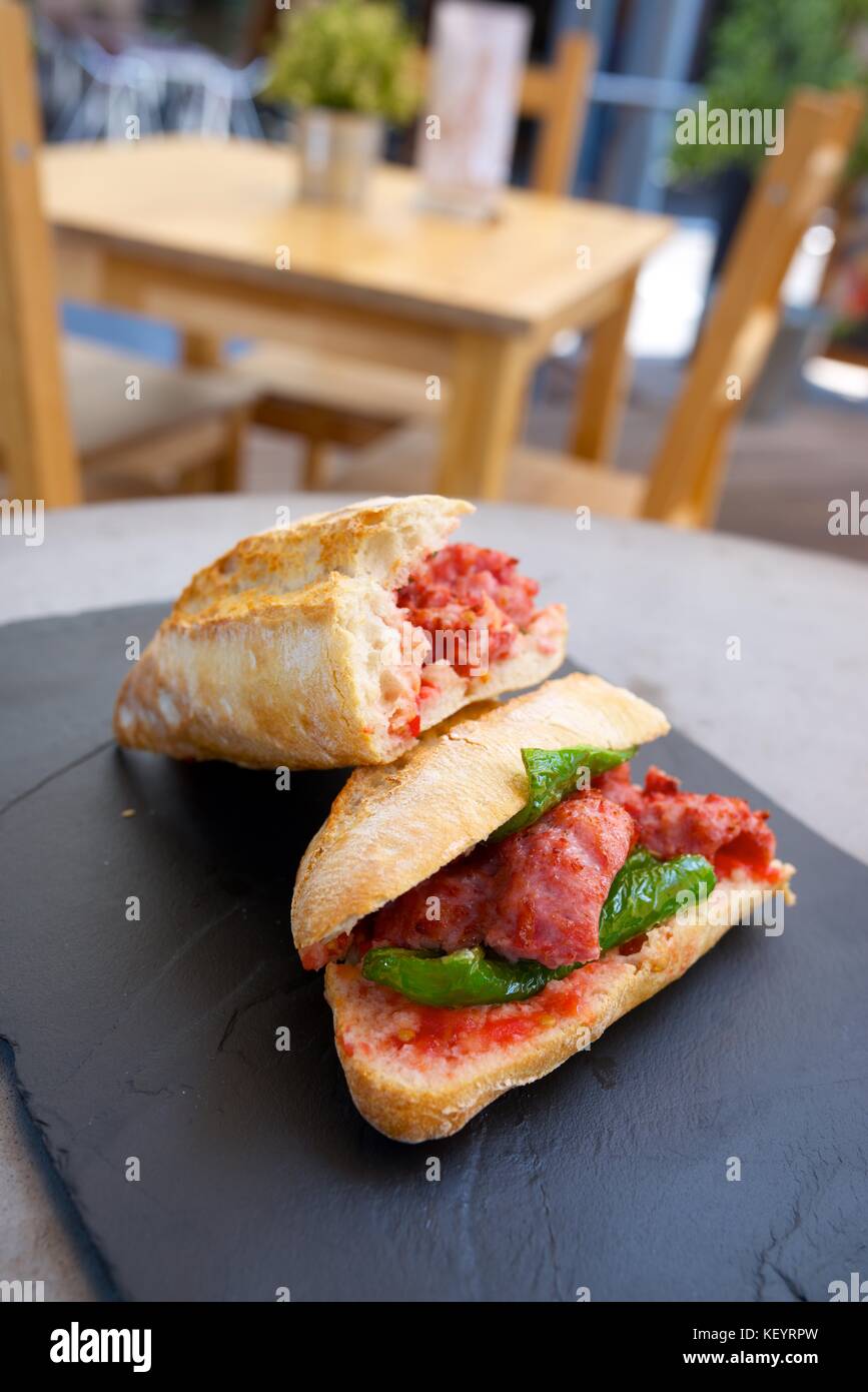 Sausage butty with green pepper and tomato Stock Photo Alamy