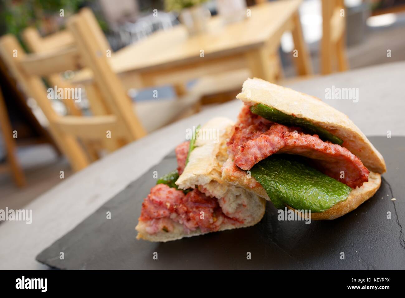 Sausage butty with green pepper and tomato Stock Photo Alamy