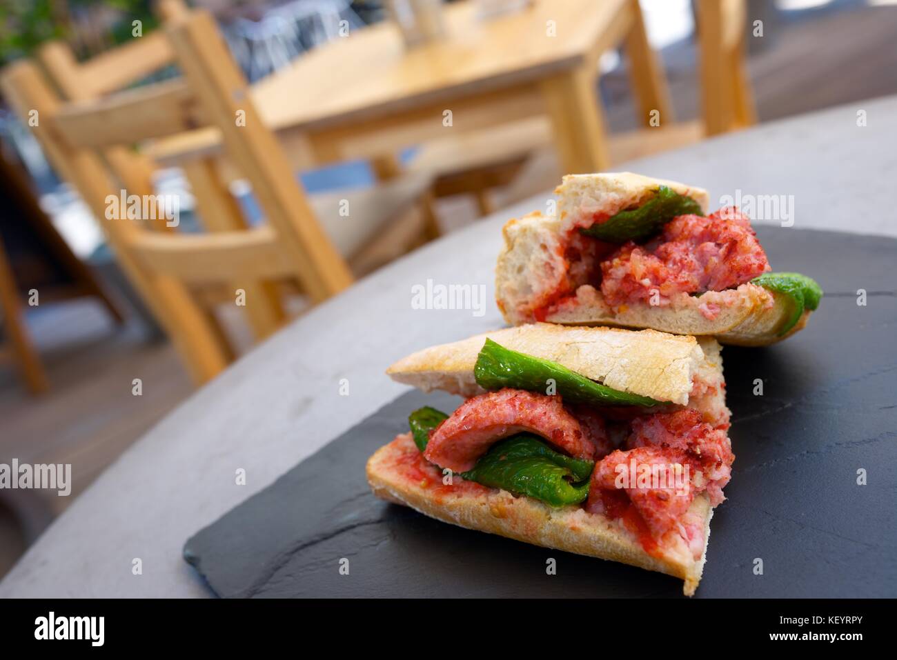 Sausage butty with green pepper and tomato Stock Photo Alamy
