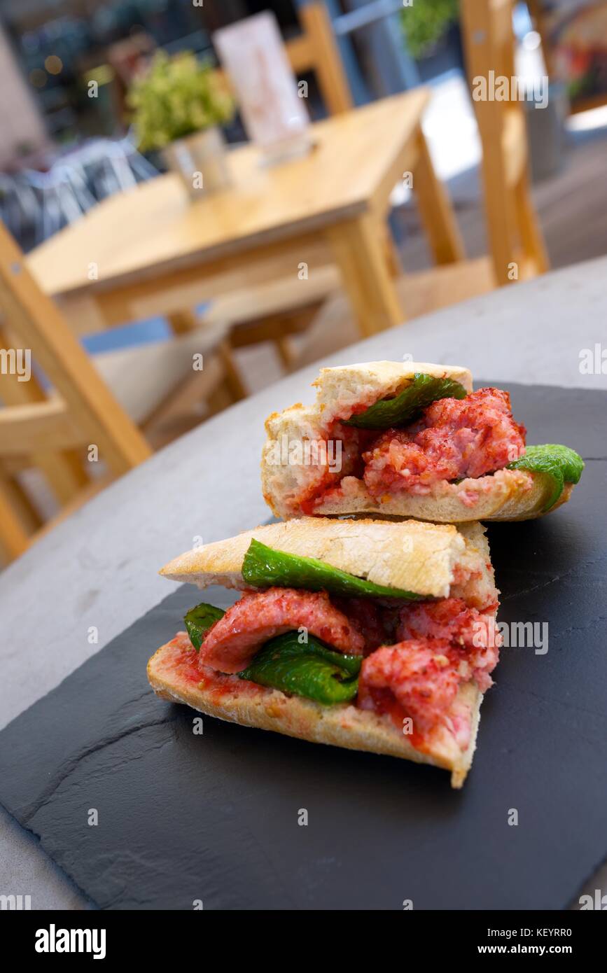 Sausage butty with green pepper and tomato Stock Photo Alamy