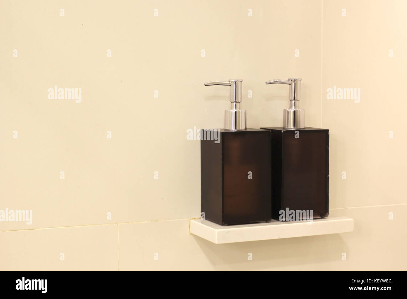 liquid soap bottle and shampoo dispenser in bathroom Stock Photo Alamy
