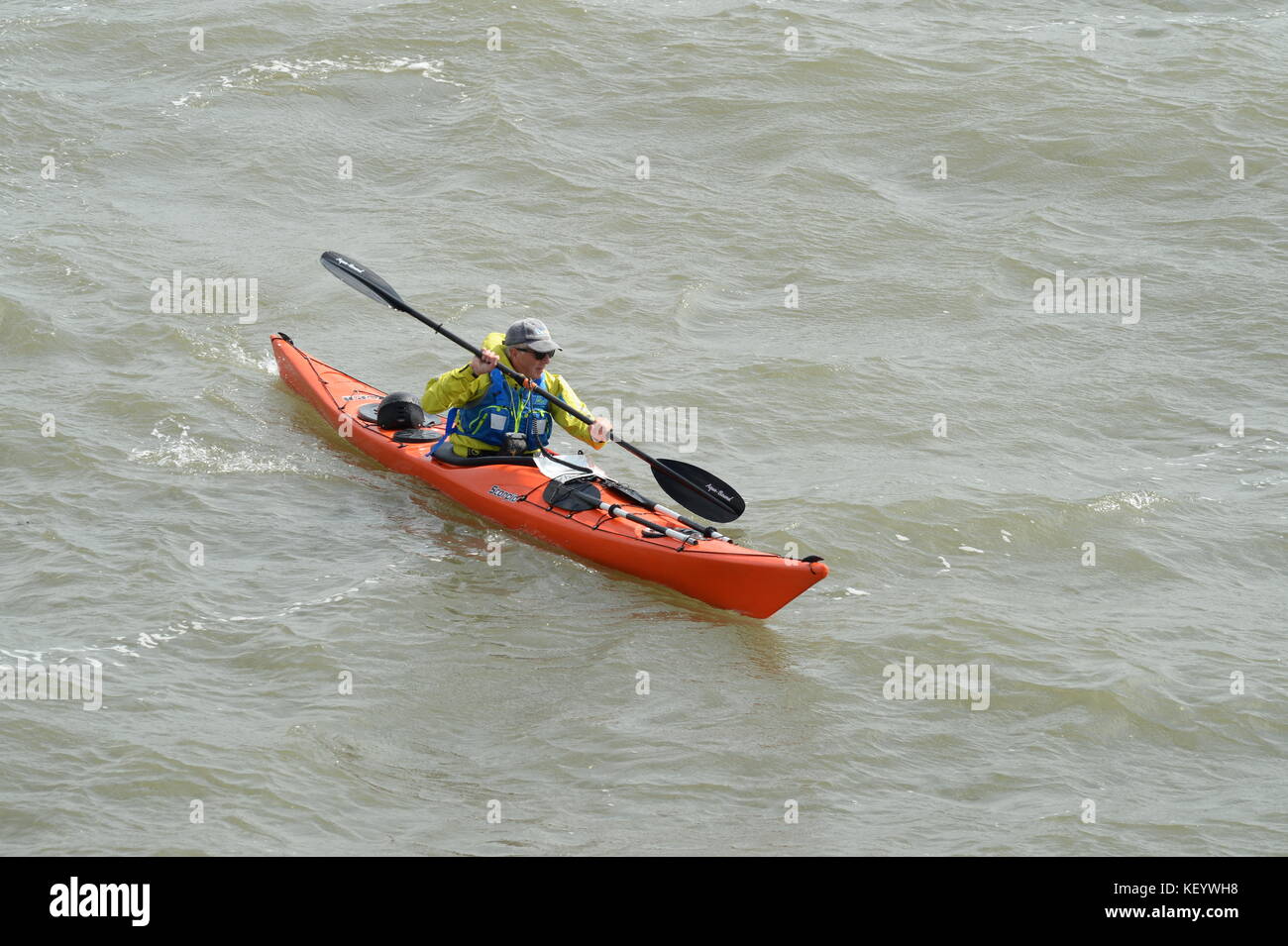 Paddling a full equipped sea kayak viewed from above Stock Photo Alamy