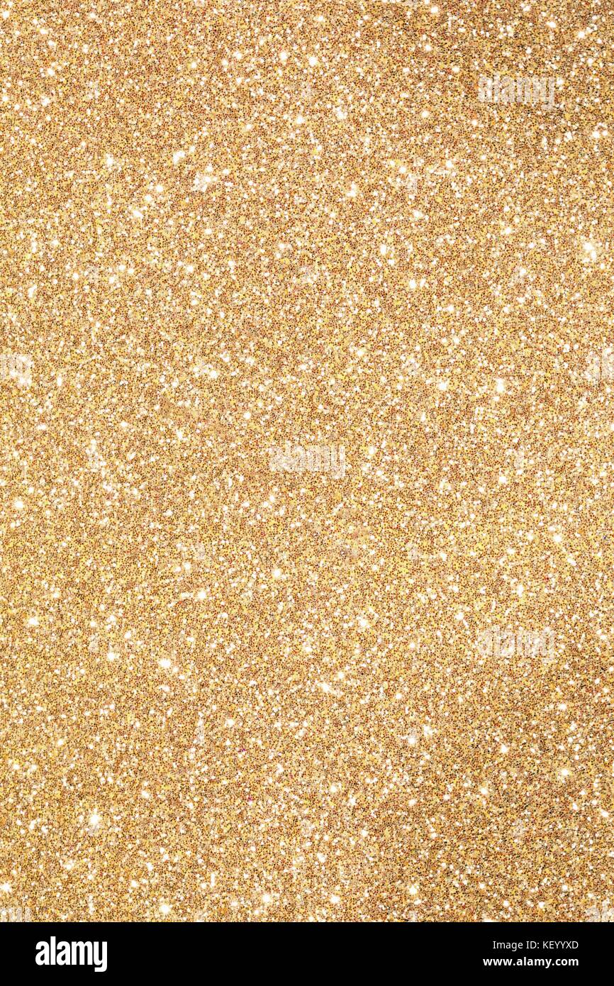 shiny glitter GOLDEN background with glitter and glare of lights Stock Photo