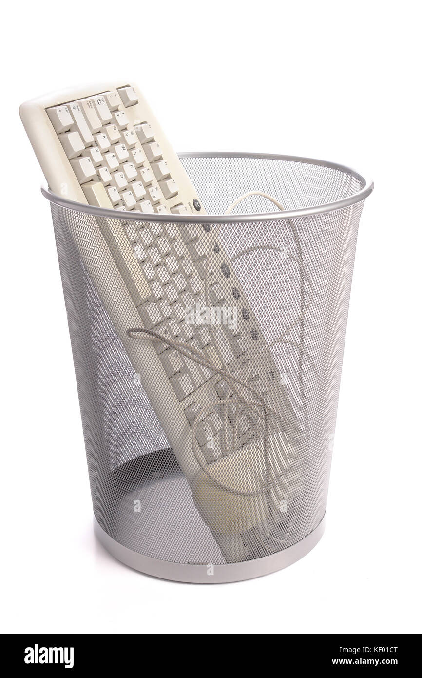 Old pc keyboard and mouse in metal trash bin over white stock photo alamy