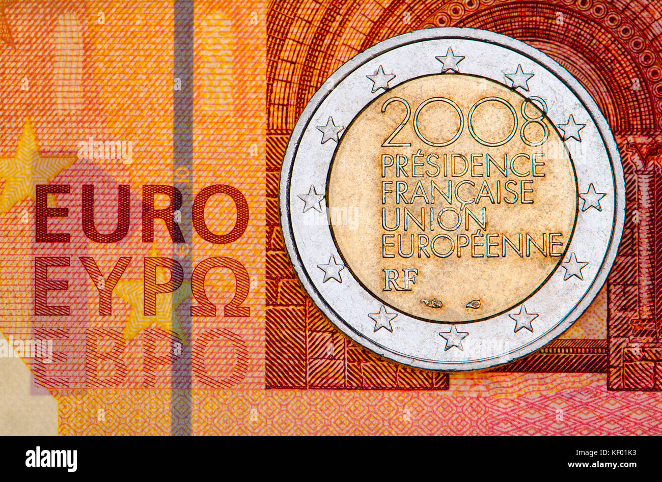 French 2 Euro coin on a 10 Euro note: 2008 - French Presidency of the EU Stock Photo