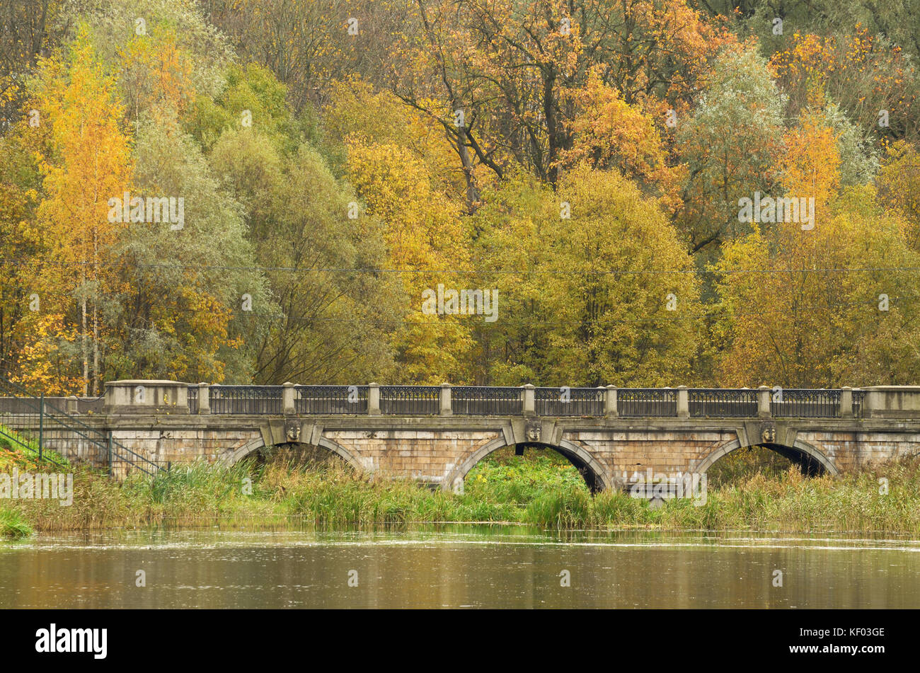 Beautiful autumn landscape with a view of the stone bridge Stock Photo ...