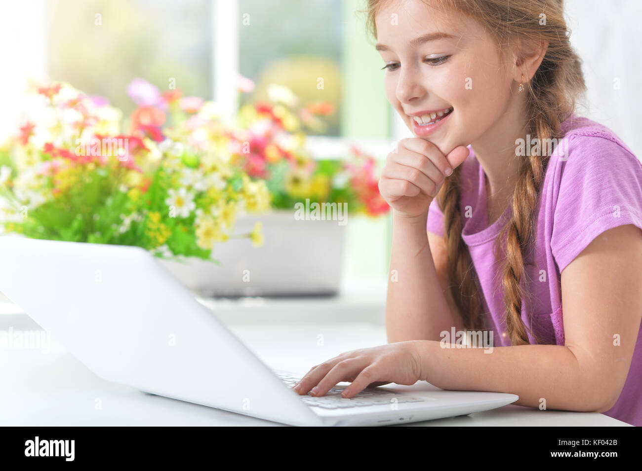girl using modern laptop Stock Photo - Alamy