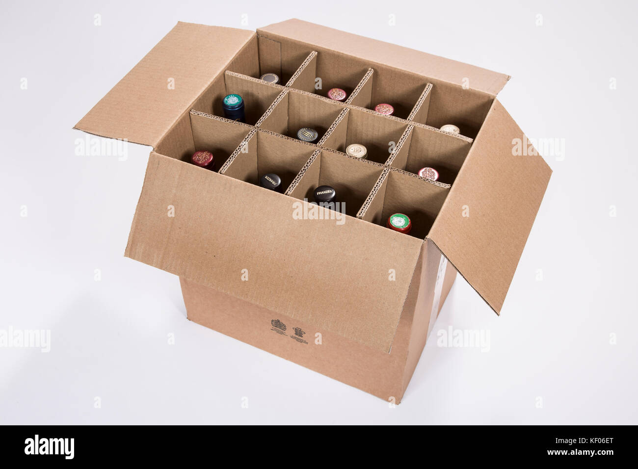 A 12 bottle brown cardboard wine box with bottles photographed on a white  background Stock Photo - Alamy