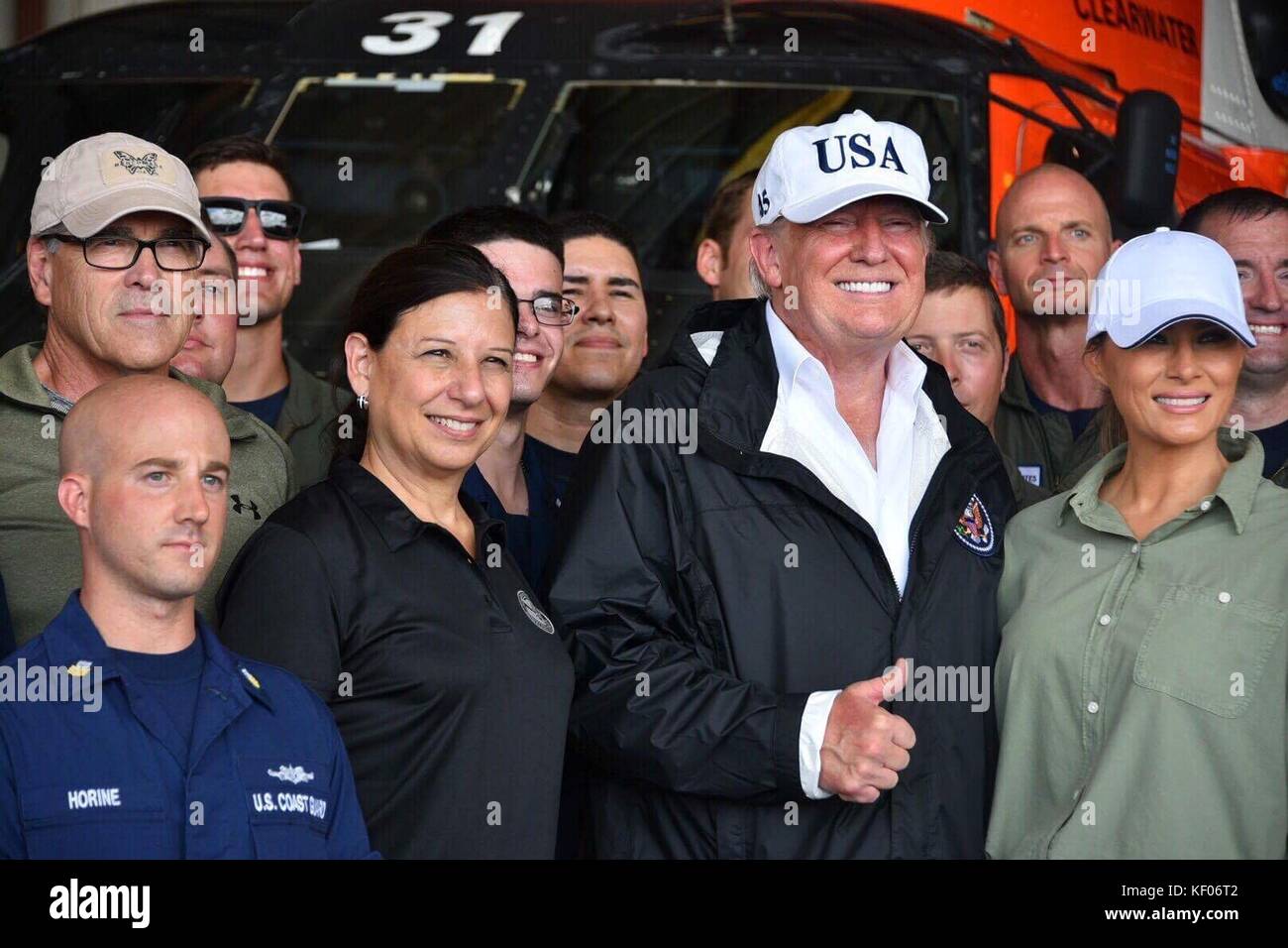 U.S. Energy Secretary Rick Perry (left), Homeland Security Acting Secretary Elaine Duke, U.S. President Donald Trump, and First Lady Melania Trump meet with U.S. Coast Guard officers in the aftermath of Hurricane Irma September 14, 2017 in Ft. Myers, Florida. Stock Photo