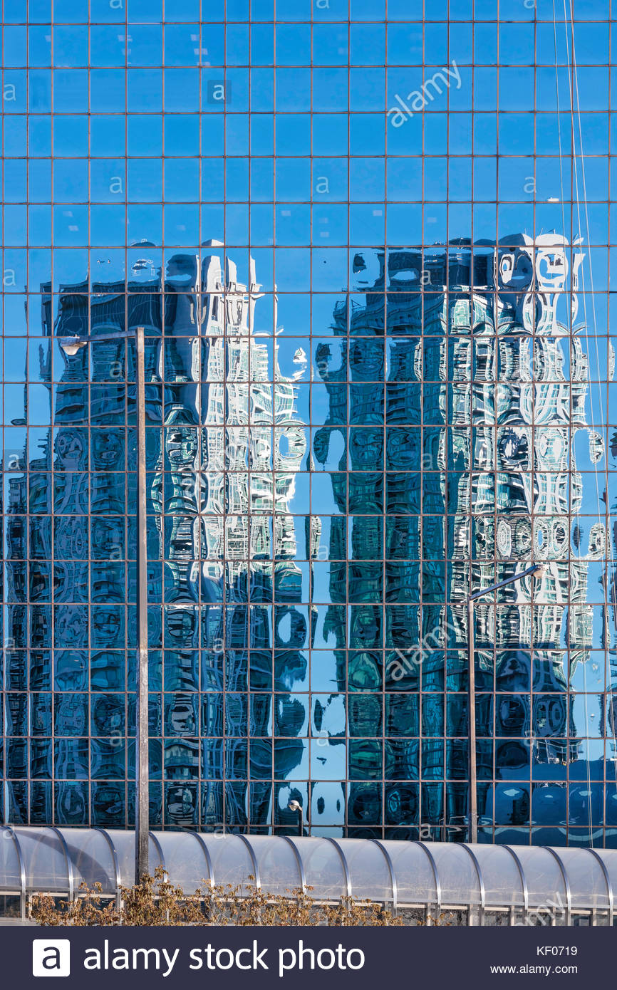 Condo Buildings Reflected In Office Building Glass Curtain Wall In