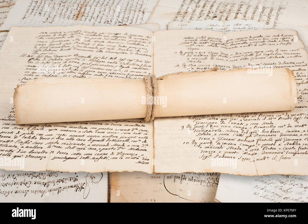 Rolled parchment on old manuscript Stock Photo Alamy