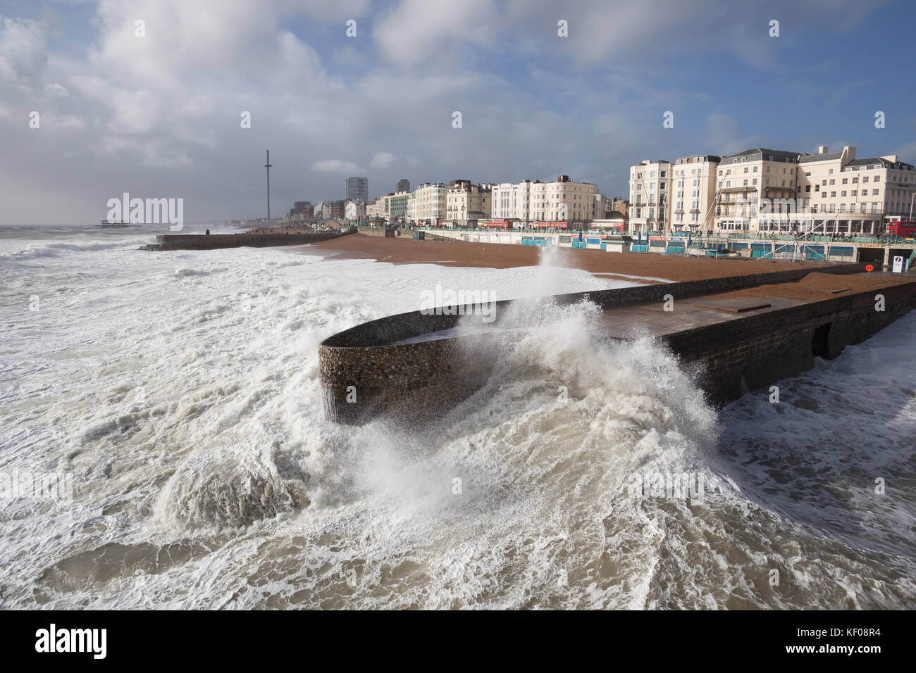 Brighton seafront - waves crashing on groyne on a stormy day. (Storm Brian) Stock Photo