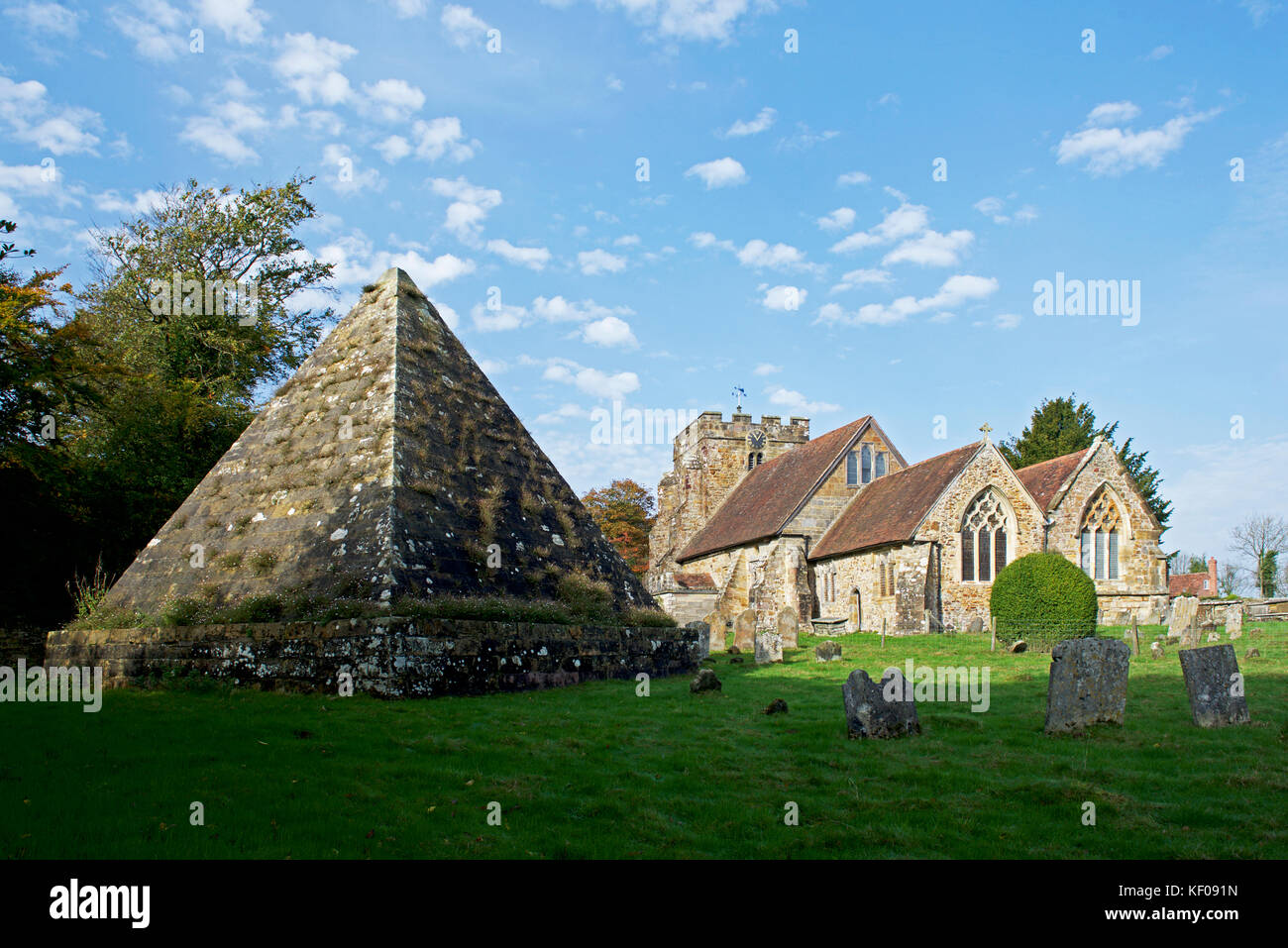 Church, dedicated to St Thomas Becket, and pyramid mausoleum, Brightling, East Sussex, England UK Stock Photo