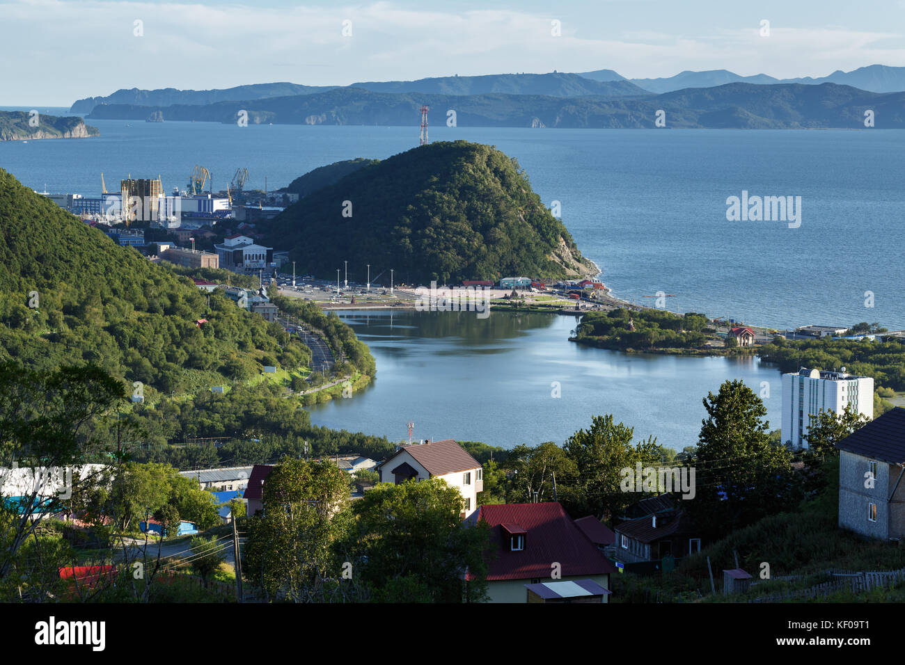 Kamchatka city landscape: view of central part of Petropavlovsk-Kamchatsky City, Avachinskaya Bay (Avacha Bay) and Pacific Ocean. Russian Far East Stock Photo