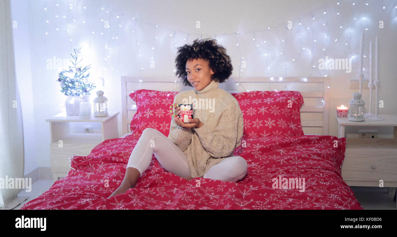 Happy young woman relaxing with coffee Stock Photo - Alamy