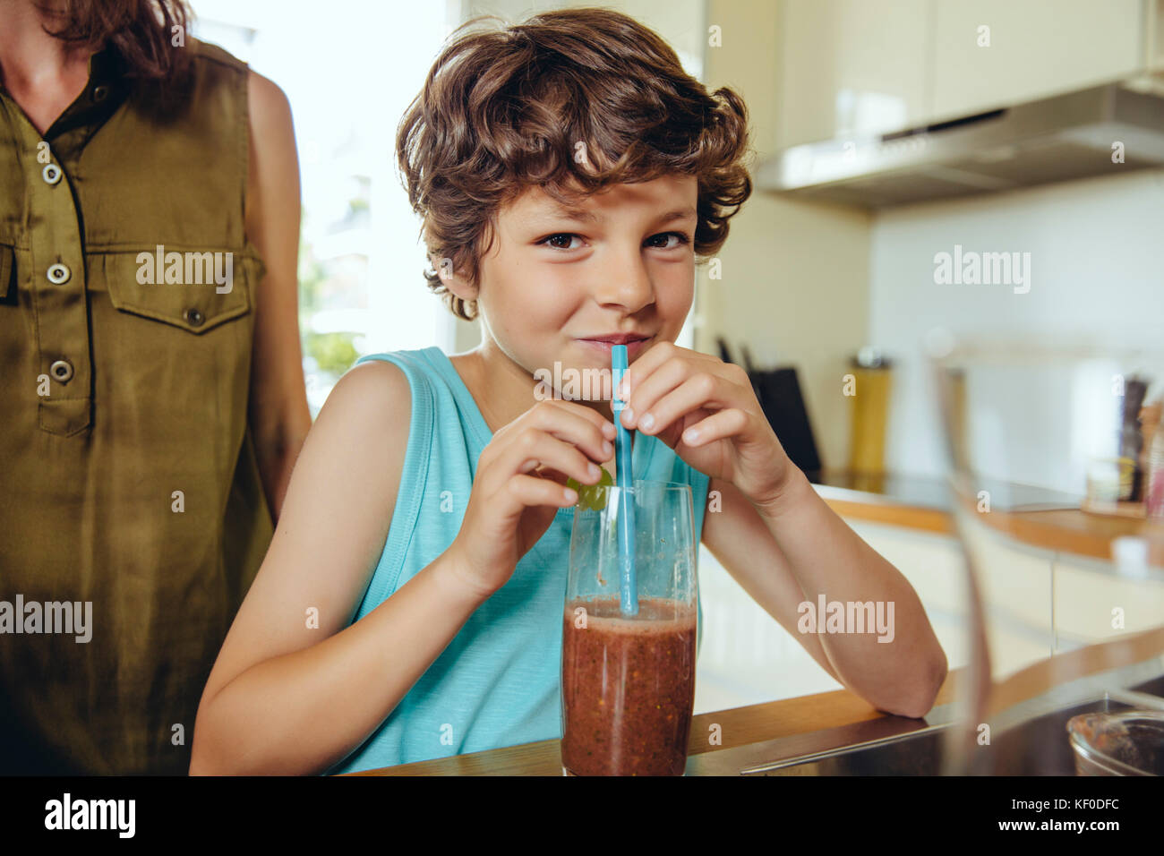 Boy enjoying his homemade smoothie Stock Photo