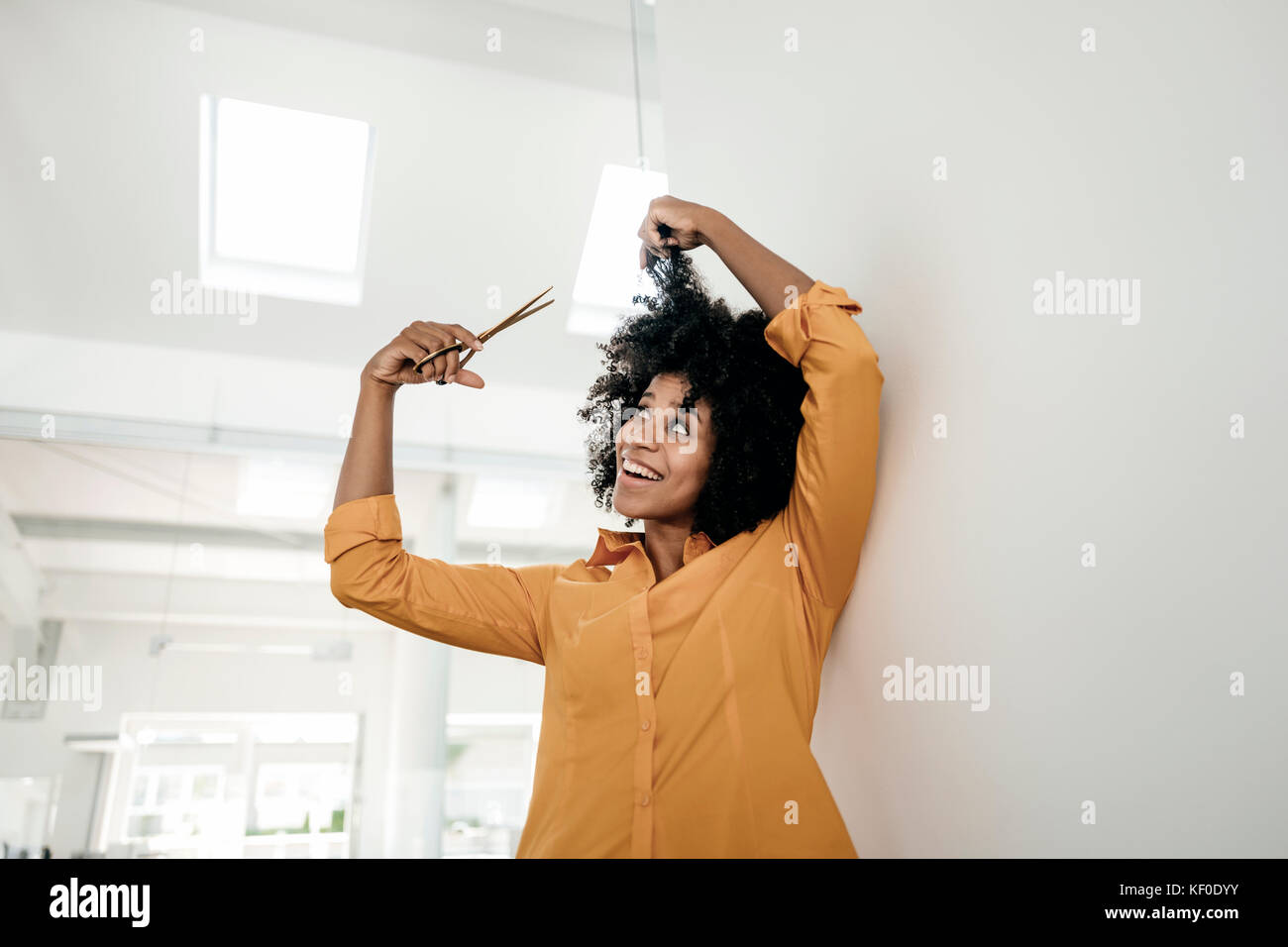 Smiling Young Woman Cutting Her Hair Stock Photo Alamy Smiling Young Woman Cutting Her Hair Stock Photo Alamy