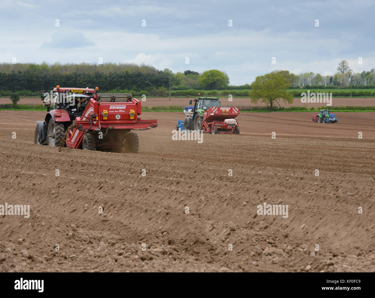 A Grimme de-stoner (left) and two Grimme potato planter, Rugeley, Staffordshire. Stock Photo