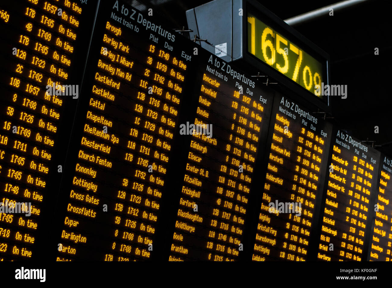An electronic, train station information and departure board showing