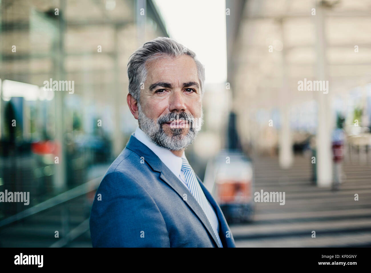 Portrait of confident businessman outdoors Stock Photo - Alamy