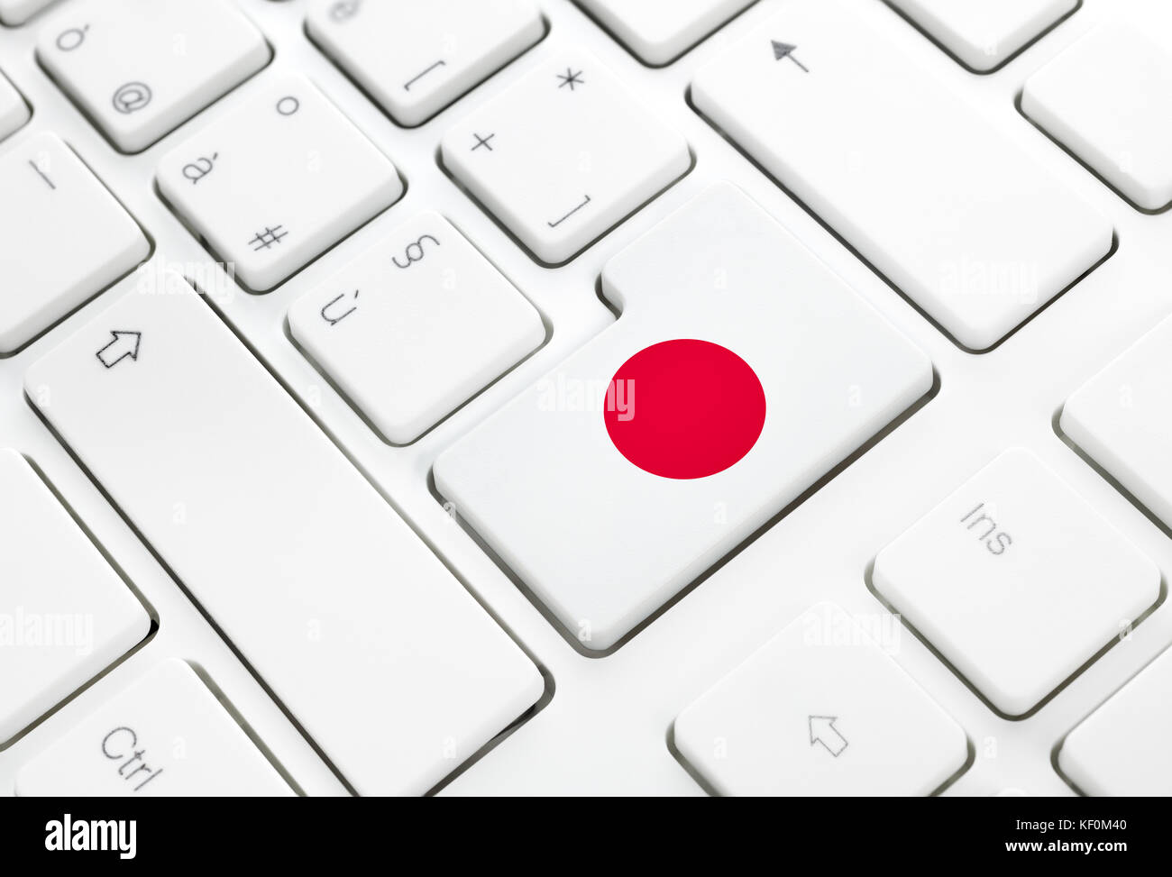 Japanese language or Japan web concept. National flag enter button or key on white keyboard Stock Photo