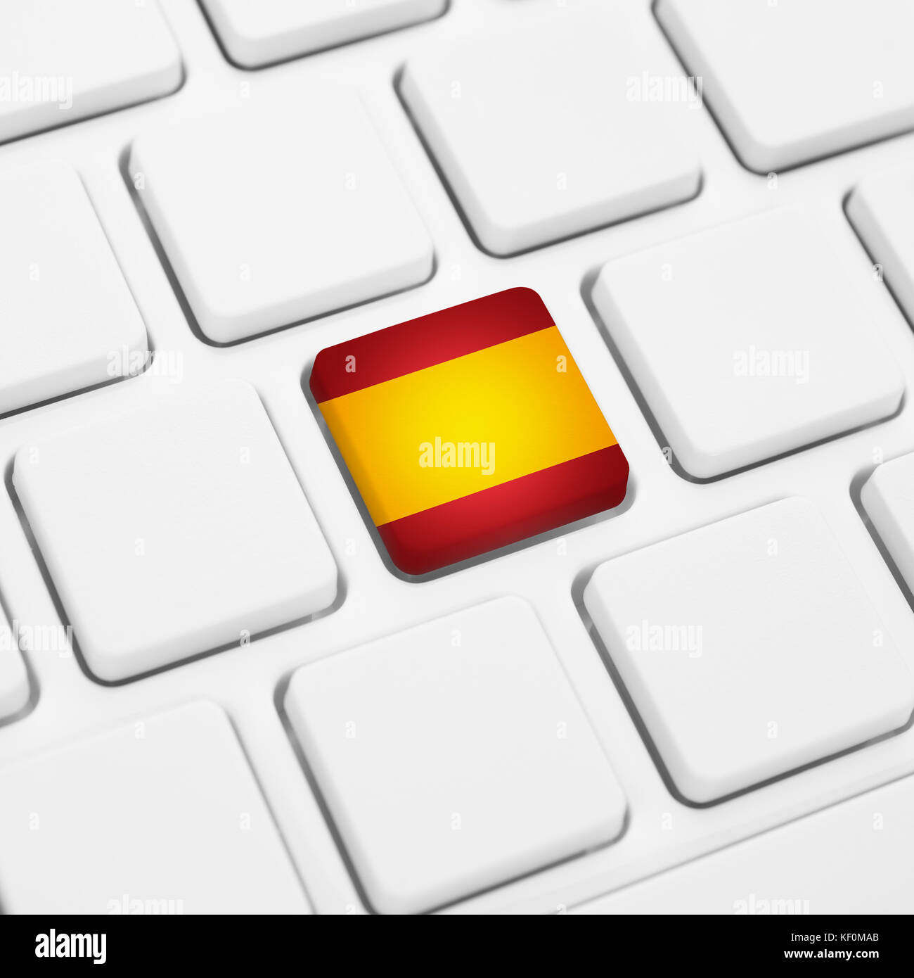 Spanish language or spain web concept. National flag button or key on white keyboard Stock Photo
