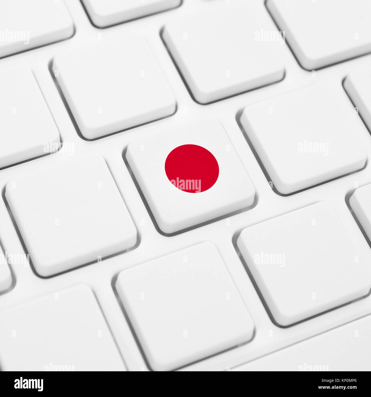 Japanese language or Japan web concept. National flag button or key on white keyboard Stock Photo