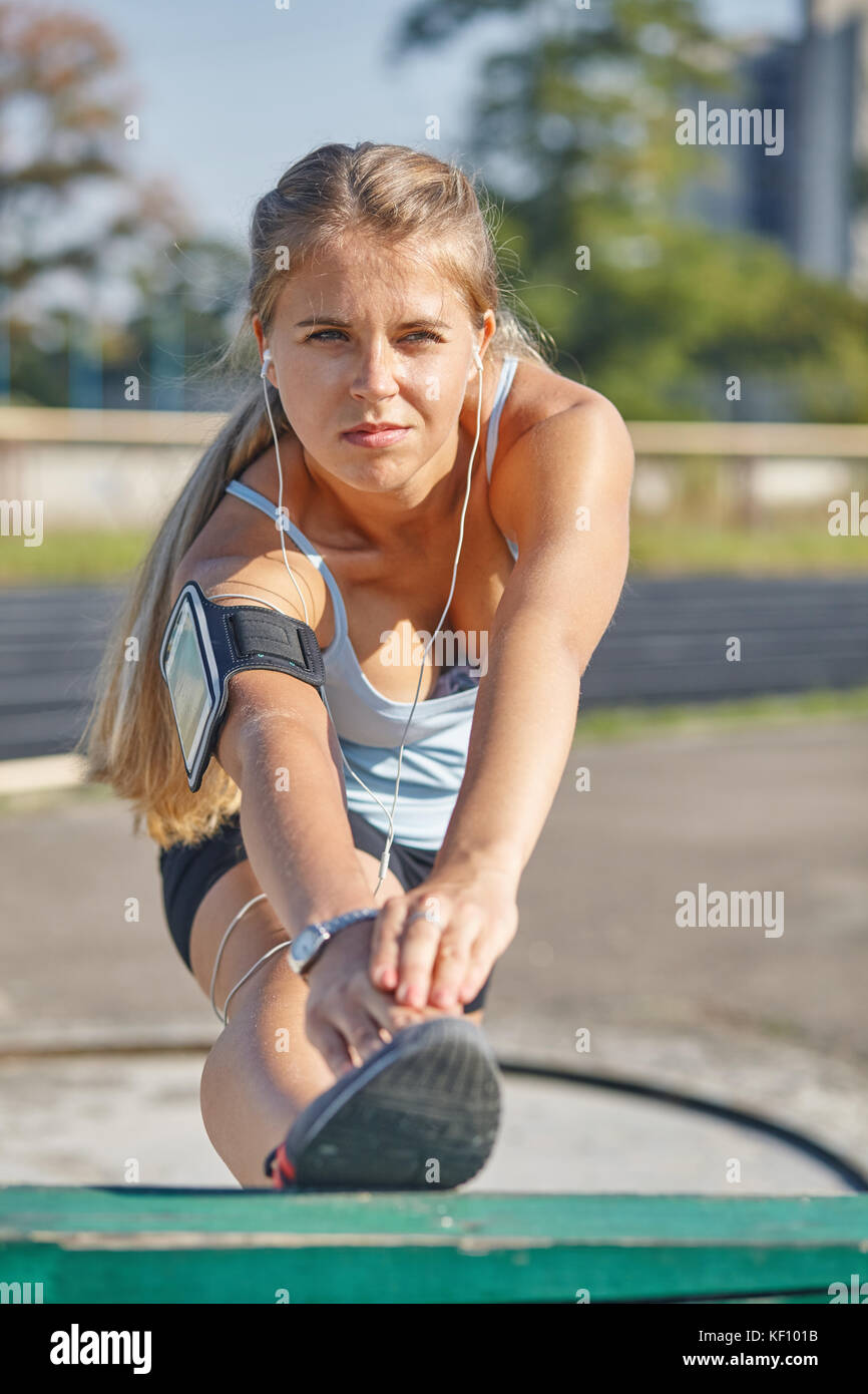 woman doing sports outdoors Stock Photo