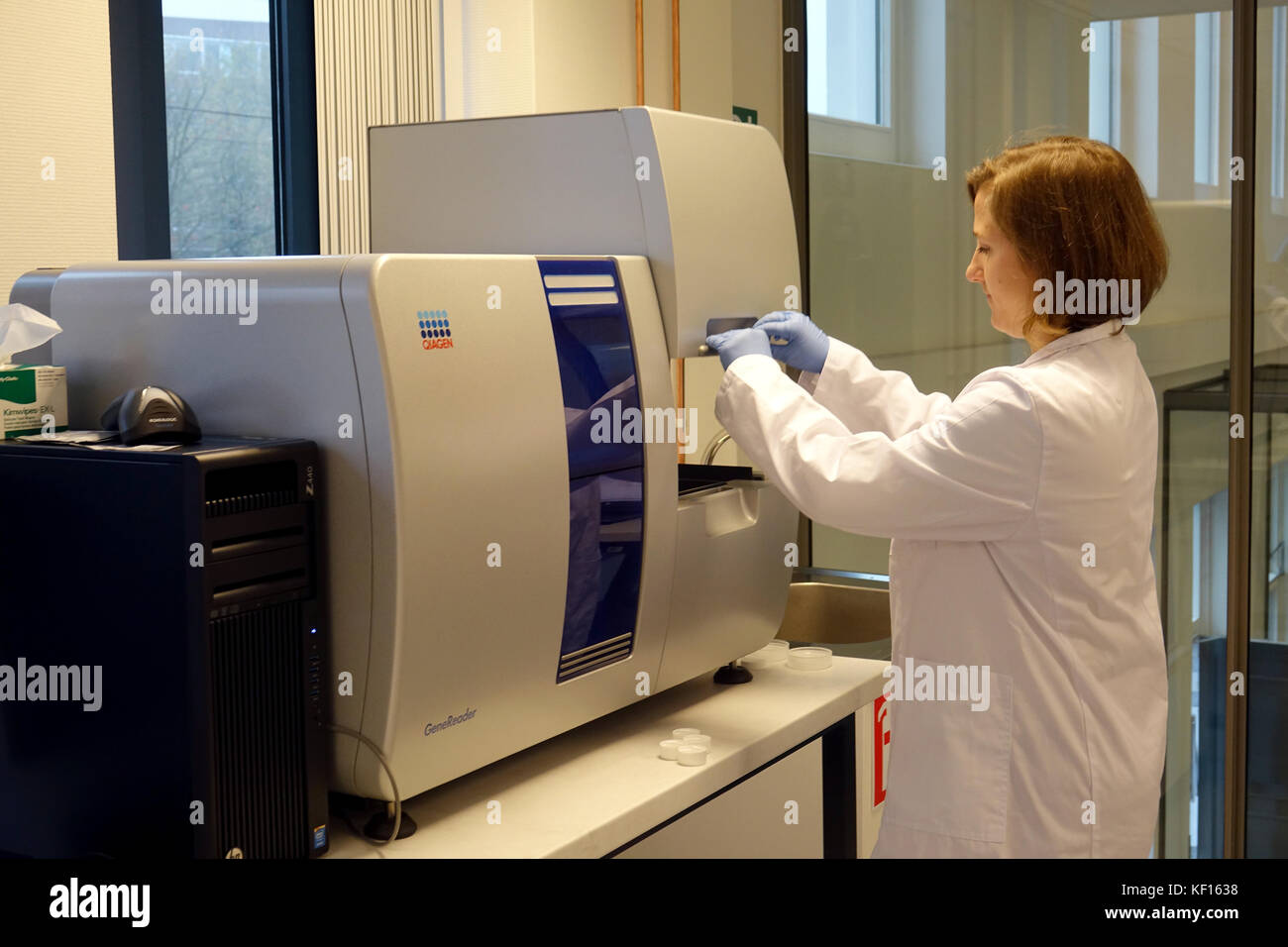 Genereader Microbiologist Michelle Peck working with a GeneReader in the ...