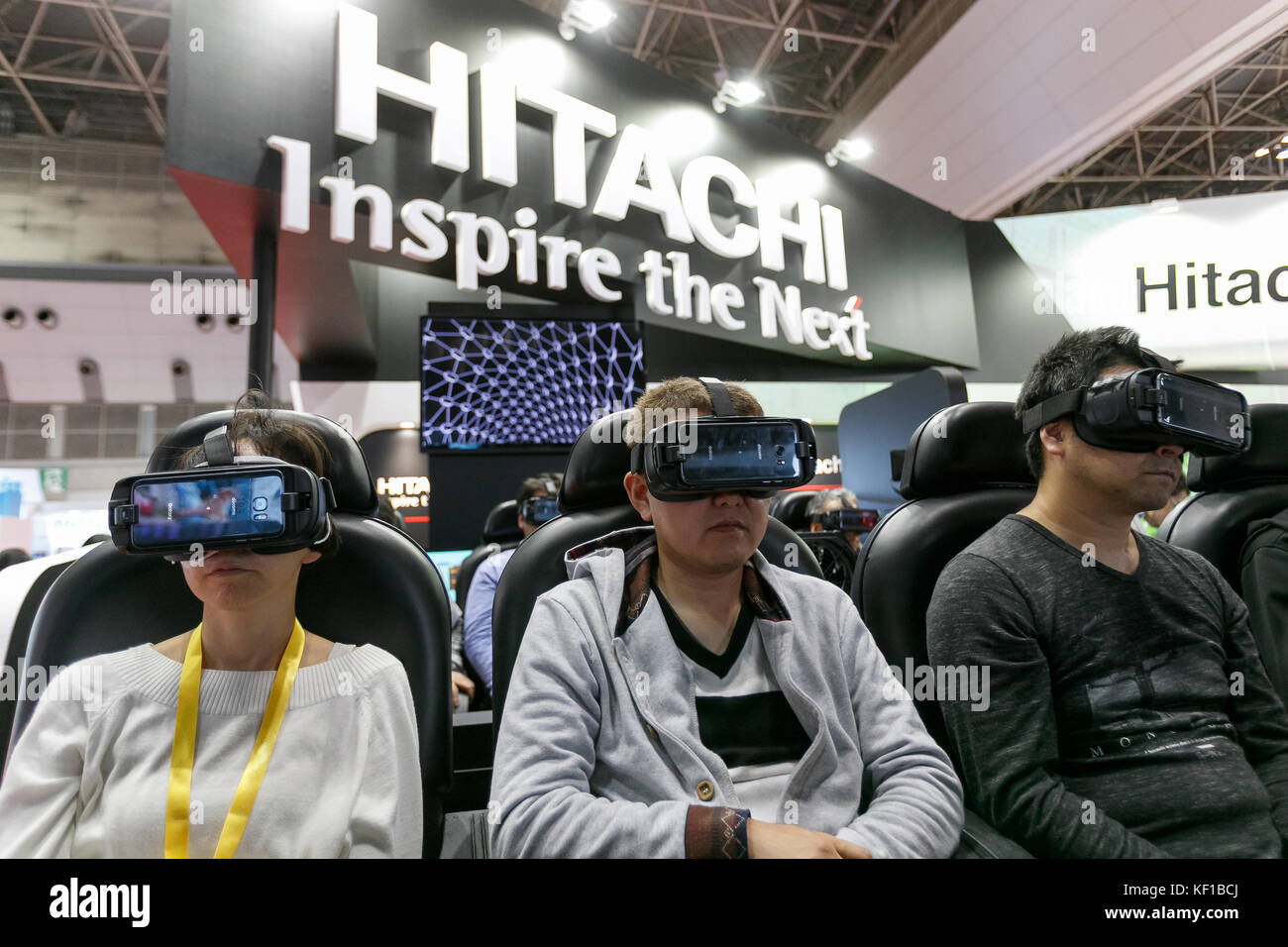 Japanese Virtual Racing Tokyo, Japan. 25th Oct, 2017. Visitors test a VR (Virtual Reality ...