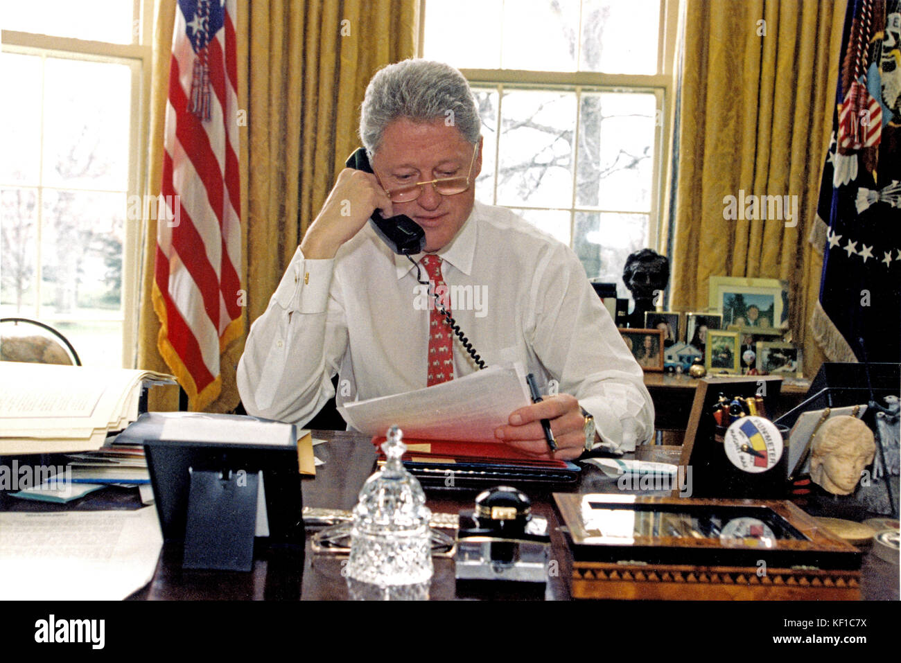 United States President Bill Clinton speaks on the telephone to President Boris Yeltsin of Russia from the Oval Office of the White House in Washington, DC on February 27, 1997. Mandatory Credit: Ralph Alswang/White House via CNP - NO WIRE SERVICE - Photo: Ralph Alswang/Consolidated News Photos/Ralph Alswang - White House via CNP Stock Photo