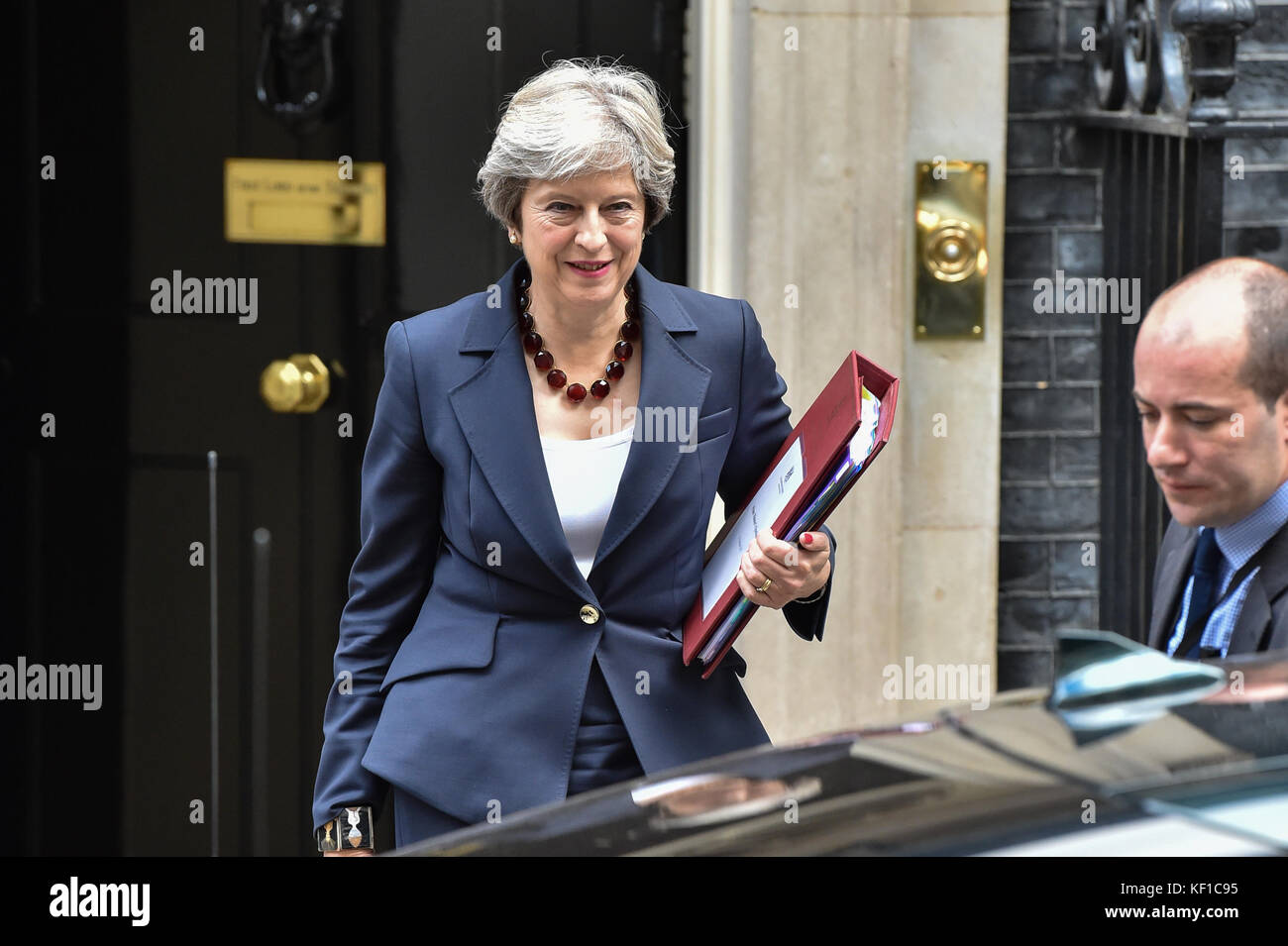 London, United Kingdom. 25th Oct, 2017. Prime Minister Theresa May leaves 10 Downing Street bound for the House of Commons for Prime Ministers Questions. Credit: Peter Manning/Alamy Live News Stock Photo