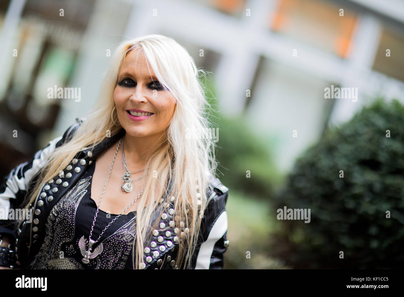 Duesseldorf, Germany. 25th Oct, 2017. Heavy Metal singer Doro Pesch can be seen in front of a hotel in Duesseldorf, Germany, 25 October 2017. The rock singer is presenting her first ever German album 'Fuer Immer' (lit. 'Forever'). Credit: Rolf Vennenbernd/dpa/Alamy Live News Stock Photo