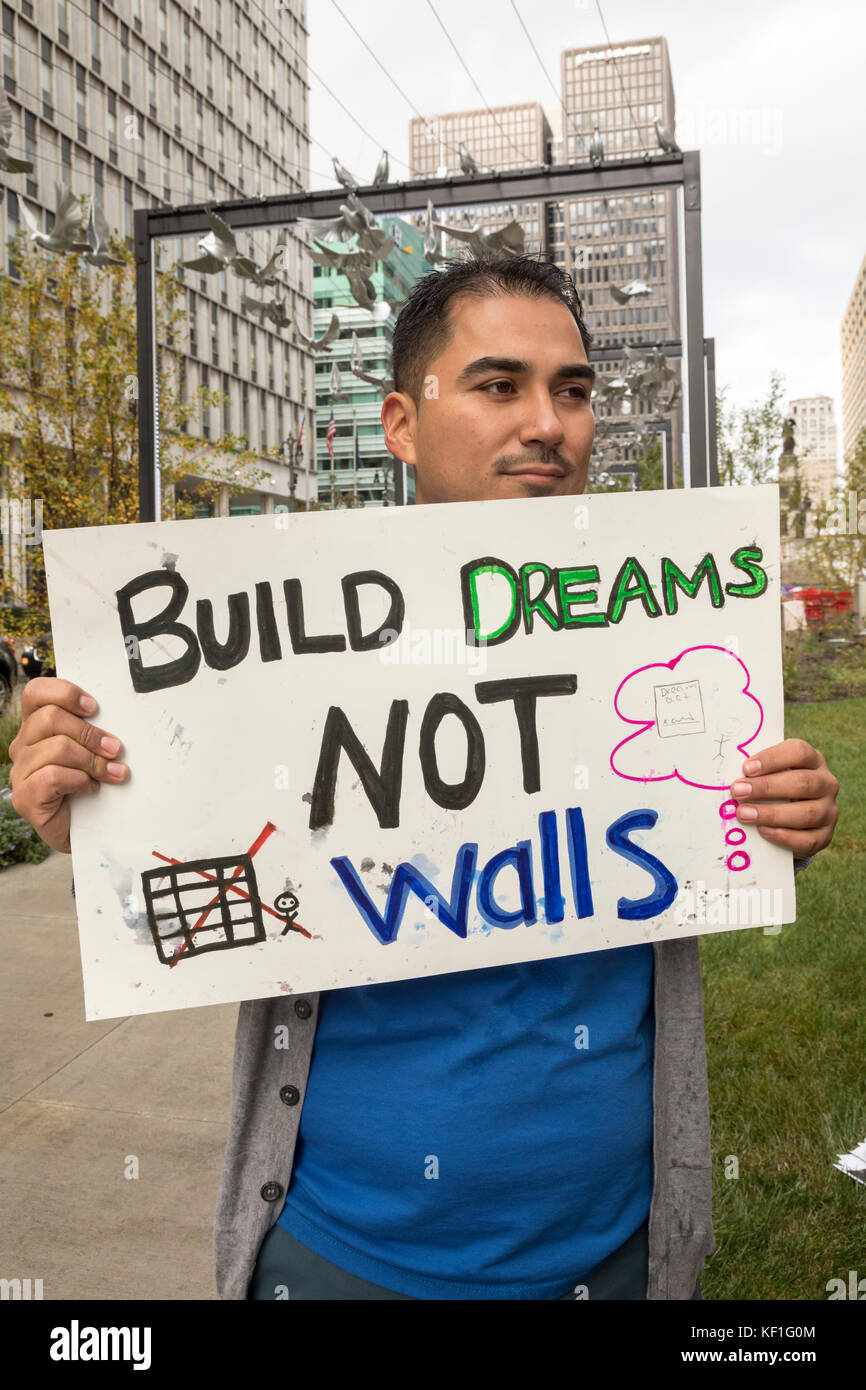 Detroit, Michigan, USA. 25th Oct, 2017. Immigrants and supporters rally for the 2017 Dream Act, which would allow undocumented immigrants brought to the U.S. as children to stay without fear of deportation. A new effort to enact the DREAM Act began after President Trump cancelled President Obama's Deferred Action for Childhood Arrivals program. Credit: Jim West/Alamy Live News Stock Photo
