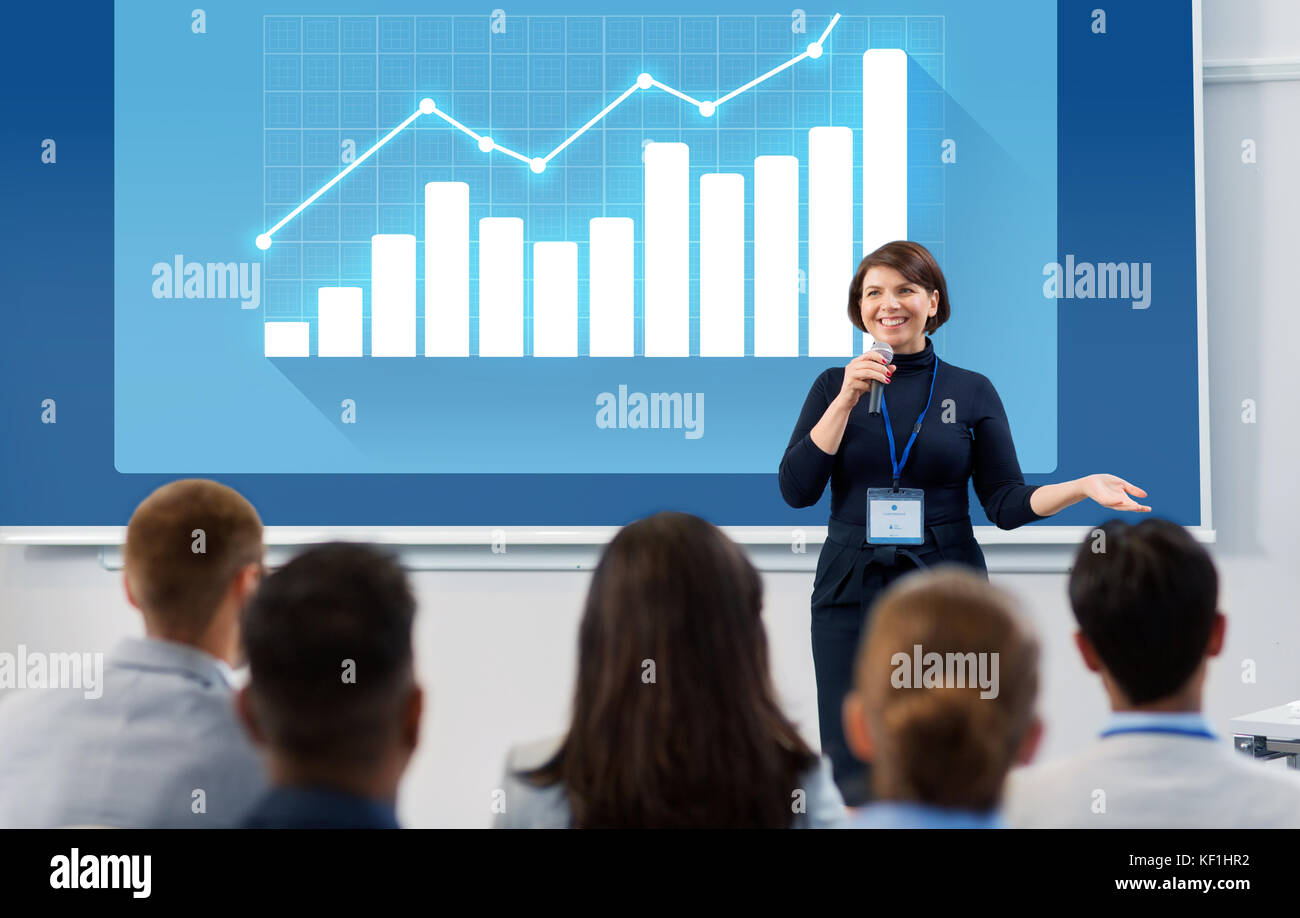 group of people at business conference or lecture Stock Photo