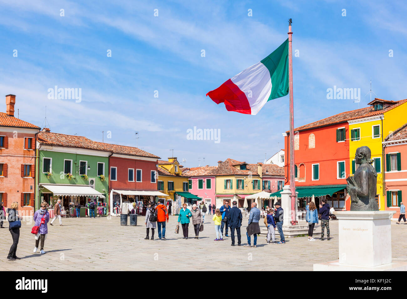 VENICE ITALY VENICE Italian flag flying in the Piazza Baldassare Galuppi Burano main square island of Burano island Venice lagoon Venice Italy Europe Stock Photo