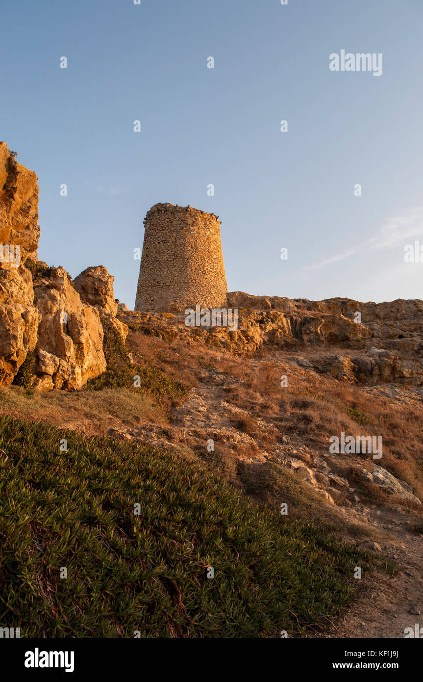 Corsica, Ile-Rousse (Red Island): sunset on the Genoese Tower built in the 15th century on the top of the Ile de la Pietra (Stone Island), promontory Stock Photo