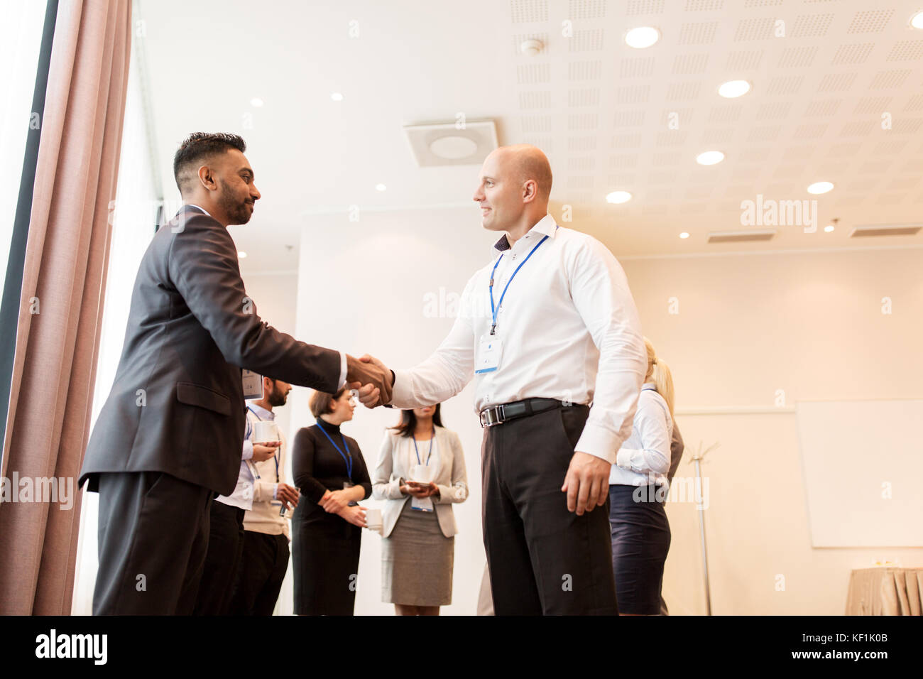 handshake of people at business conference Stock Photo Alamy
