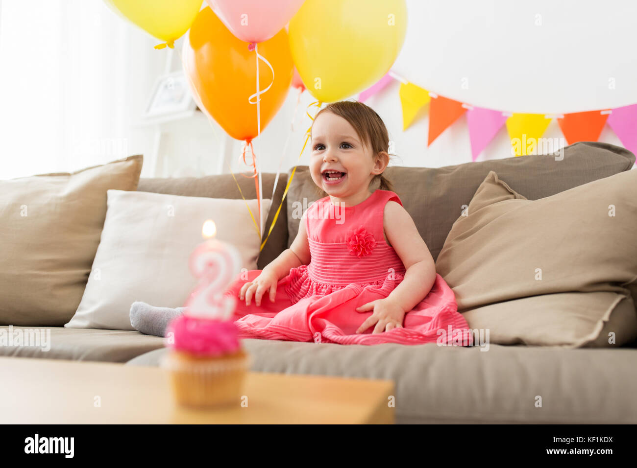 happy baby girl on birthday party at home Stock Photo - Alamy