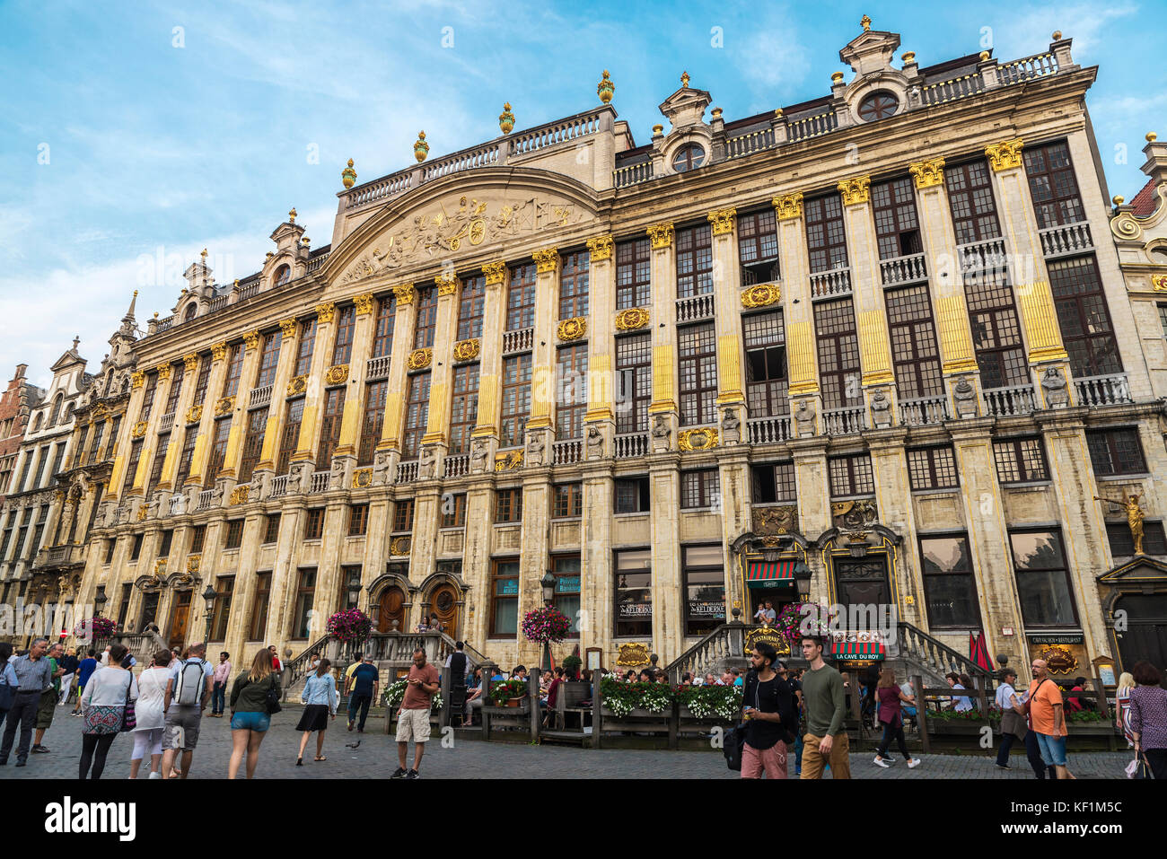 Brussels, Belgium - August 26, 2017: Mansion of the Dukes of Brabant at the Grand Place with people walking around in Brussels, Belgium Stock Photo