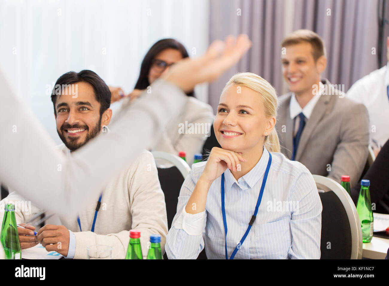 group of people at business conference or lecture Stock Photo