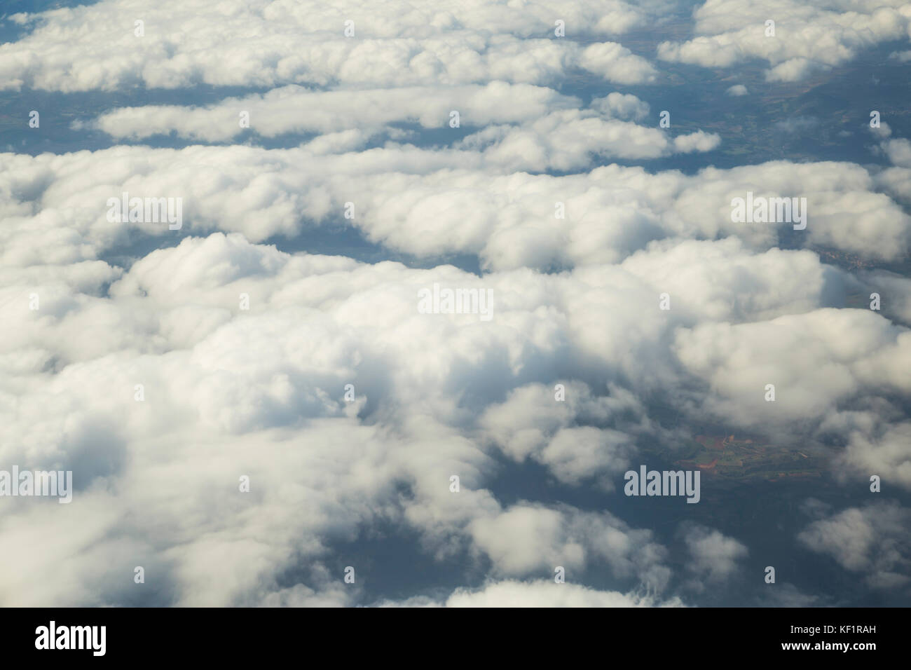 Aerial photography with white fluffy clouds Stock Photo - Alamy