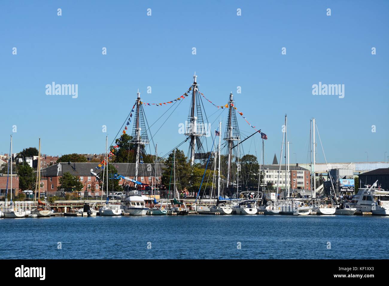 The historic USS Constitution sailing in Boston Harbor after a series