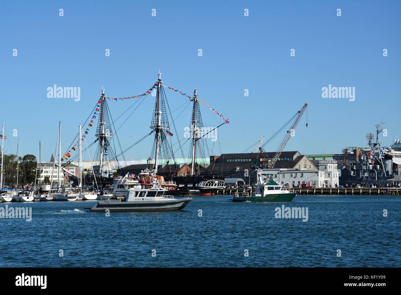 The historic USS Constitution sailing in Boston Harbor after a series