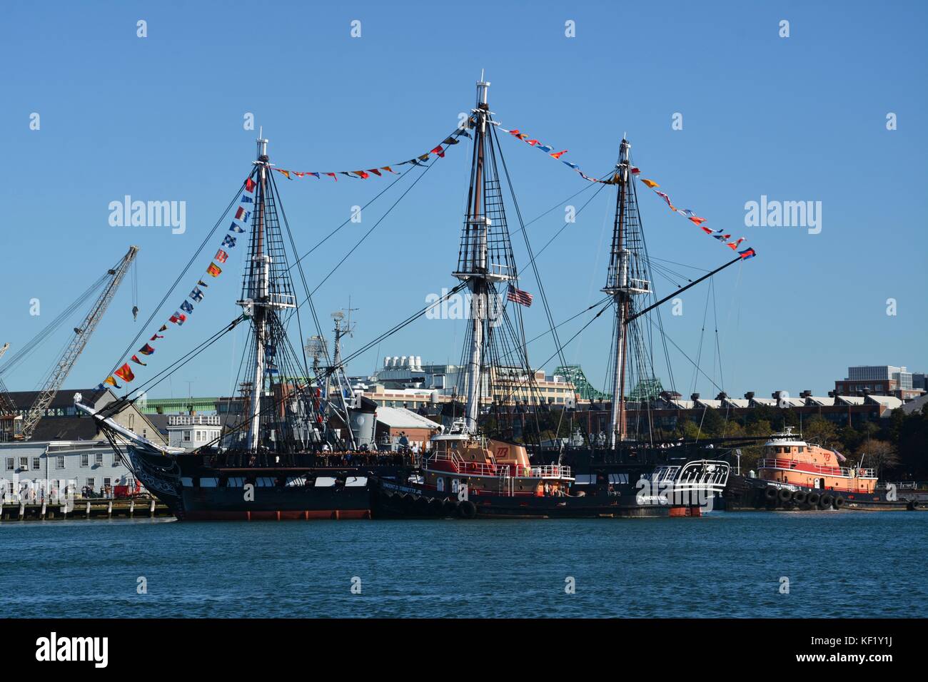The historic USS Constitution sailing in Boston Harbor after a series