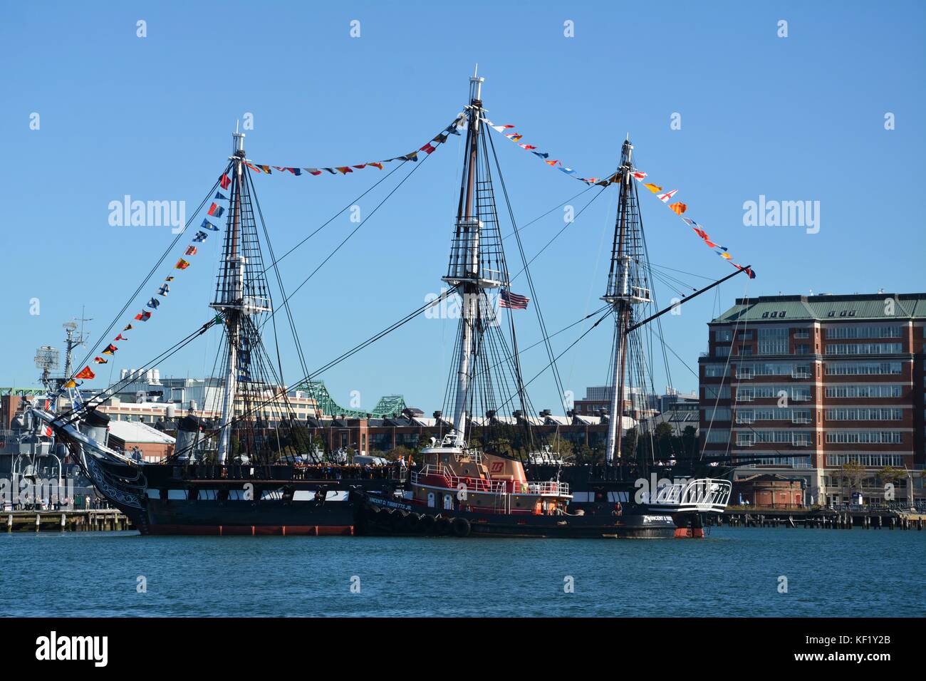The historic USS Constitution sailing in Boston Harbor after a series