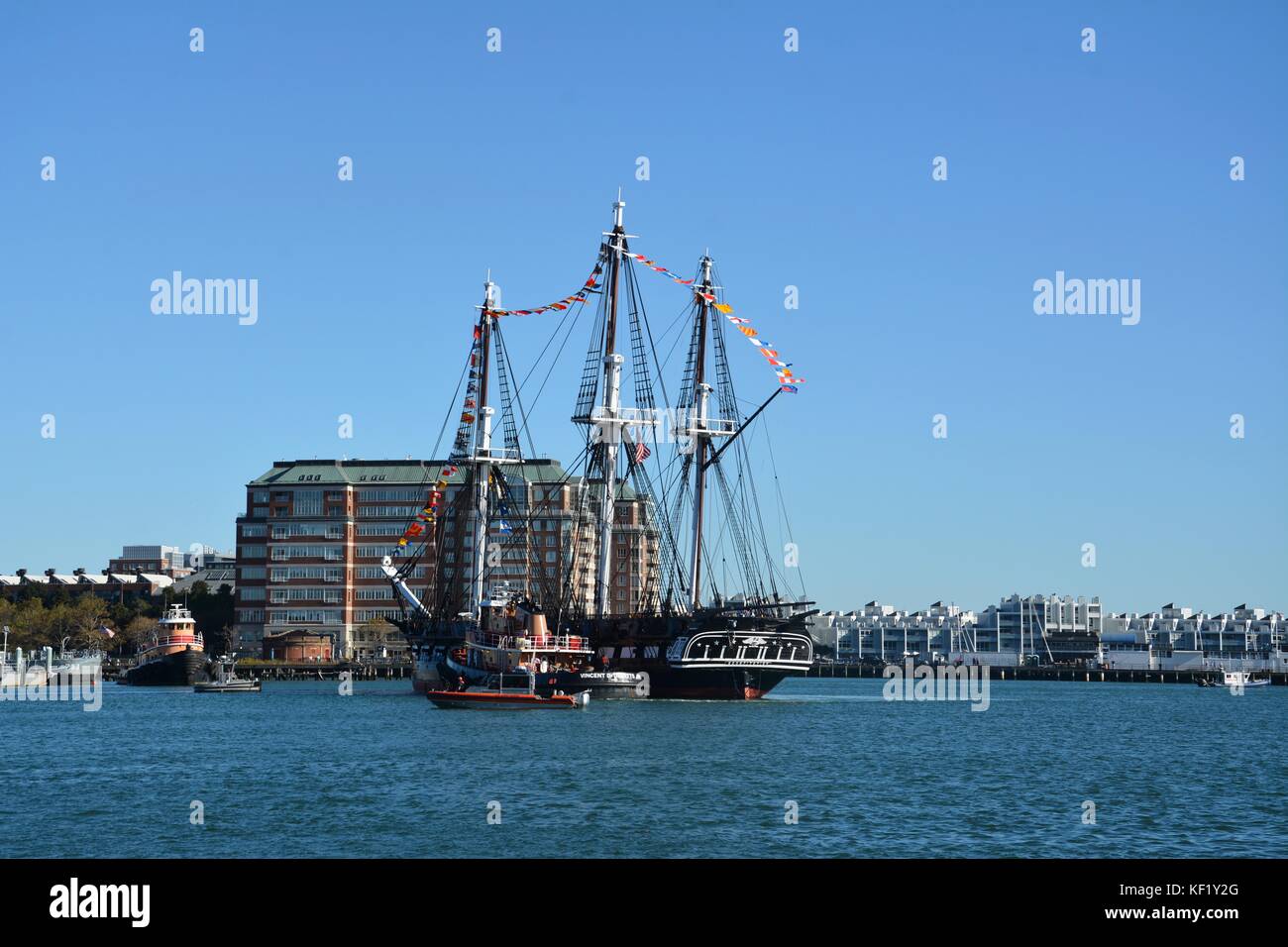 The historic USS Constitution sailing in Boston Harbor after a series