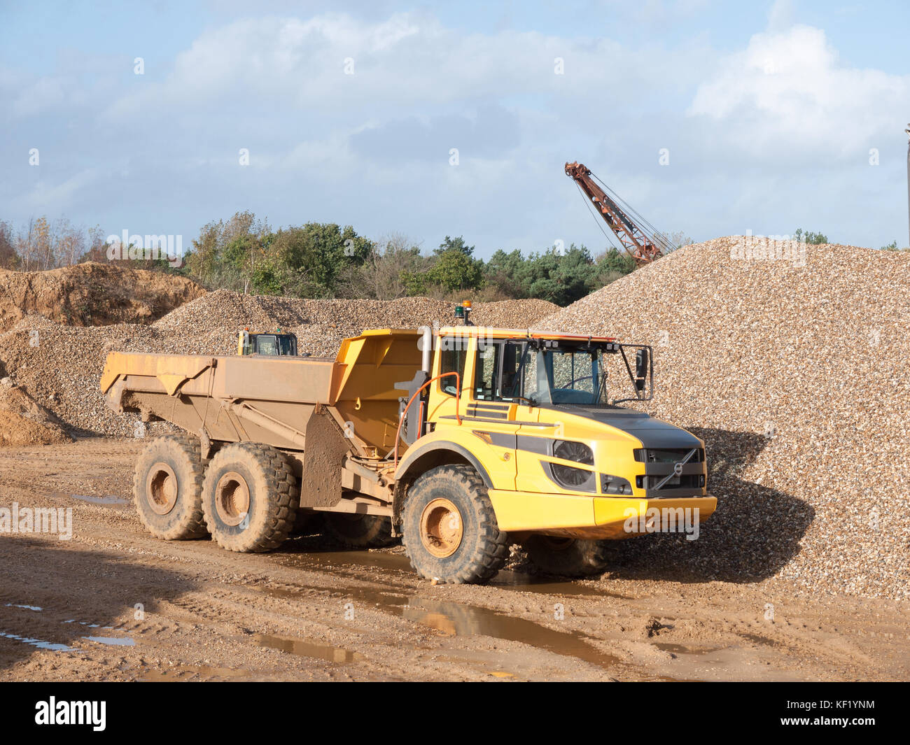 parked yellow quarry tipping truck construction big wheels; essex; england; uk Stock Photo