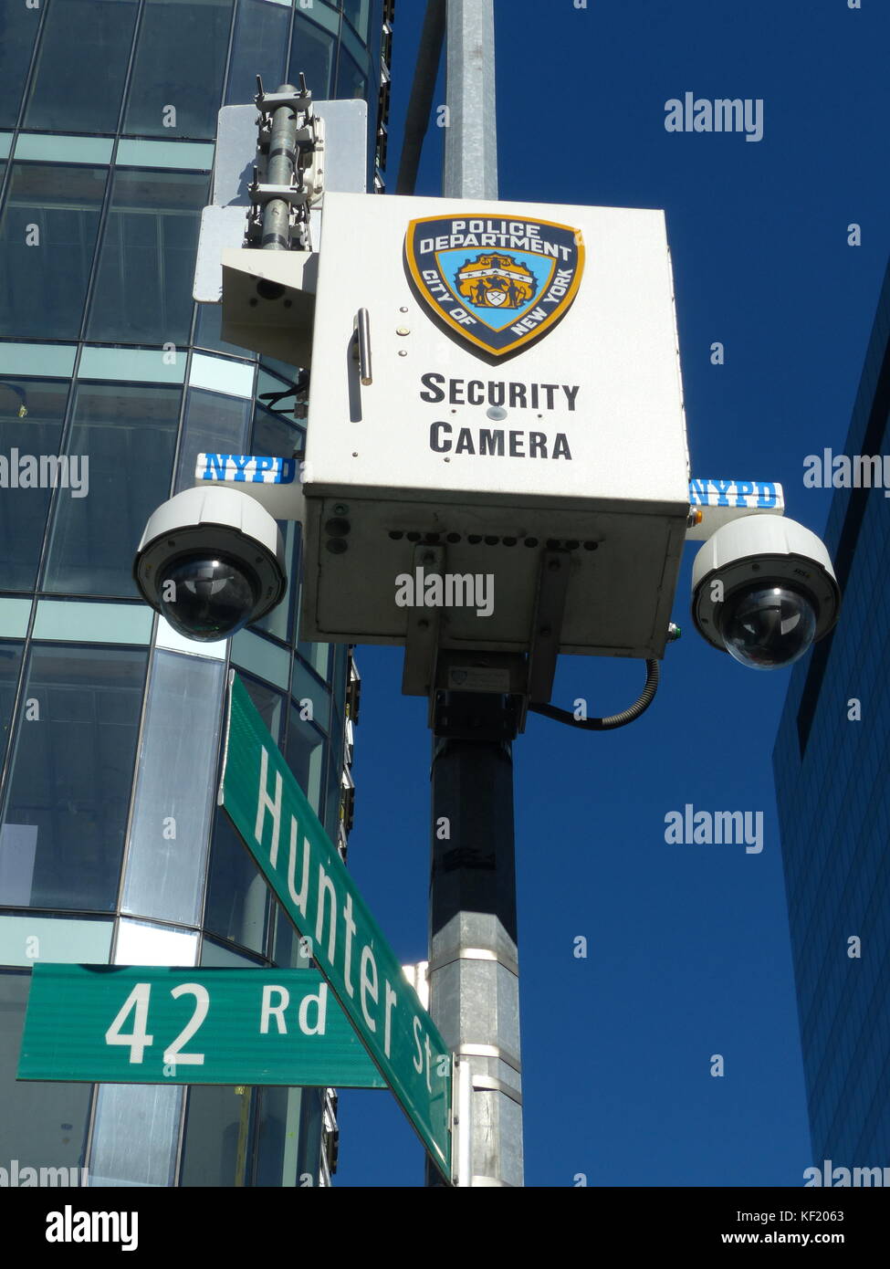 Police surveillance cameras monitor car & pedestrian traffic in Long