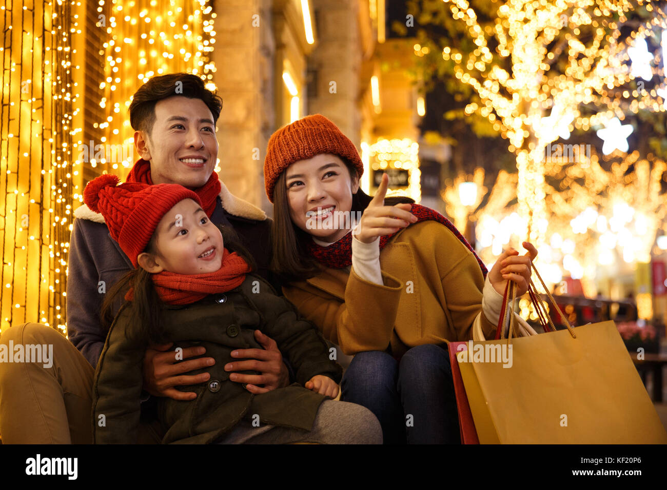 Happy family holiday shopping Stock Photo Alamy